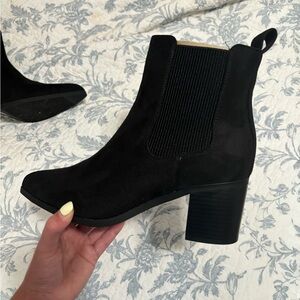 Never worn black boots. Size 7.5